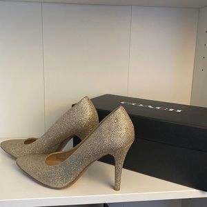 New in box gold Coach pumps 7.5